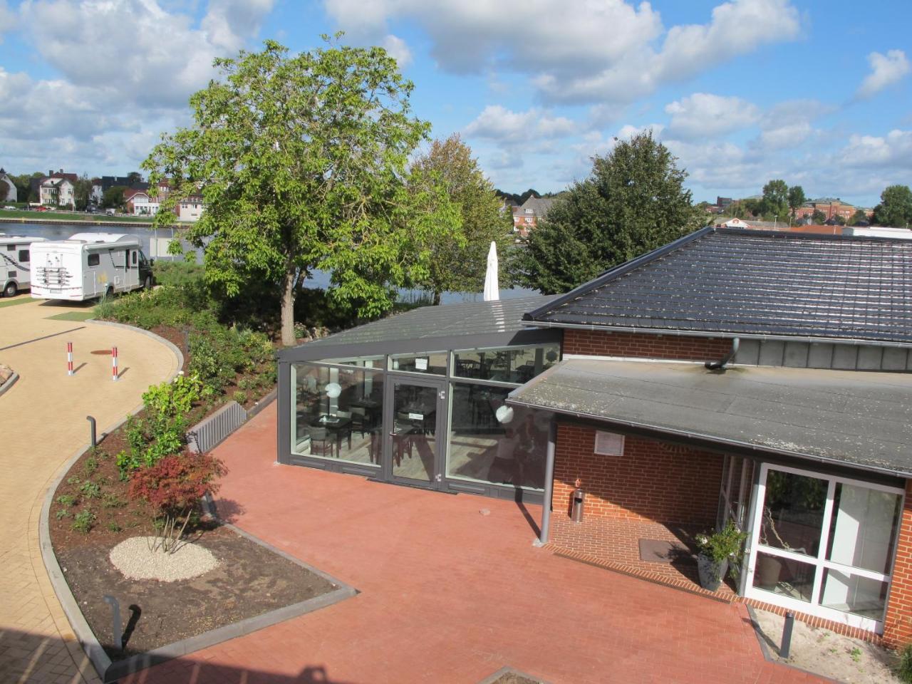 Kanal-Haus "Das Gaestehaus Direkt Am Nok" Osterrönfeld Buitenkant foto